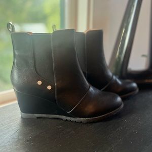 Stylish and comfy black wedge booties